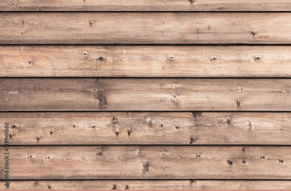 Natural wooden wall made of pine tree boards Natural wooden wall made of pine tree boards