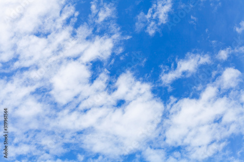 White altocumulus clouds layer in blue sky at daytime  natural background