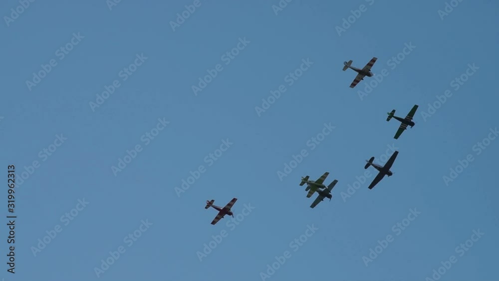 Team of light engine planes in the sky Team of light engine planes in the sky