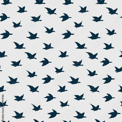 Spring Swallow Birds Simple Print. Seamless Pattern with Birds Silhouettes for fabrics textile print design, wallpapers. Dark Blue Elegant flying crabe birds isolated on grey background