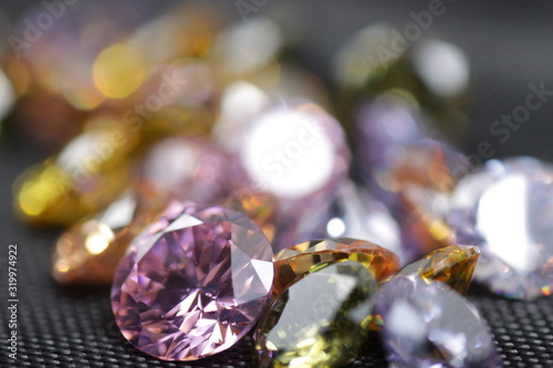 Close up shot of group beautiful multi color crystal zirconia diamonds beads for jewelry