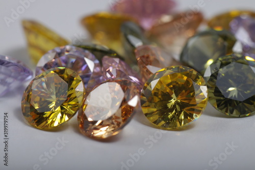 Close up shot of beautiful multi color crystal zirconia diamonds beads for jewelry 