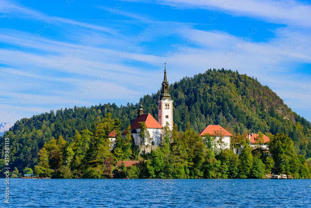 Bled Island on Lake Bled, a popular tourist destination in Slovenia Bled Island on Lake Bled, a popular tourist destination in Slovenia