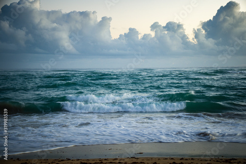 Fototapeta Naklejka Na Ścianę i Meble -  Close up of a wavy sea in the Caribbean, blue water, white foam, waves. Relaxing view.