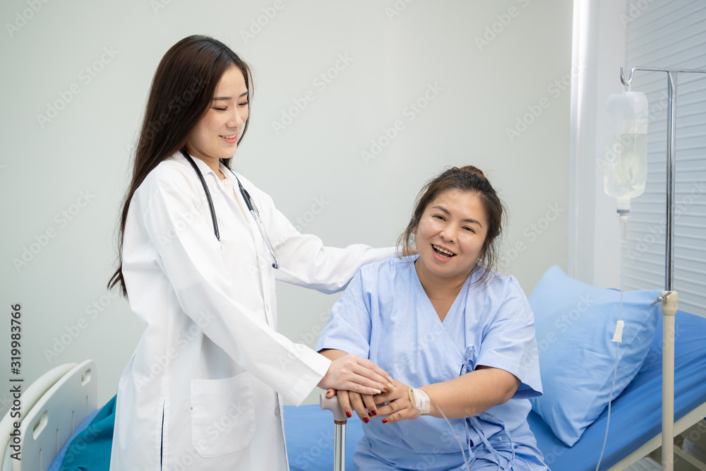 Asian doctor woman meet and talk to woman patient. Health care and healthy lifestyle concept. Asian doctor woman meet and talk to woman patient. Health care and healthy lifestyle concept.