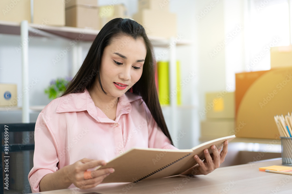 Beautiful Asian woman's portrait in e-commerce and online shopping concept. Beautiful Asian woman's portrait in e-commerce and online shopping concept.