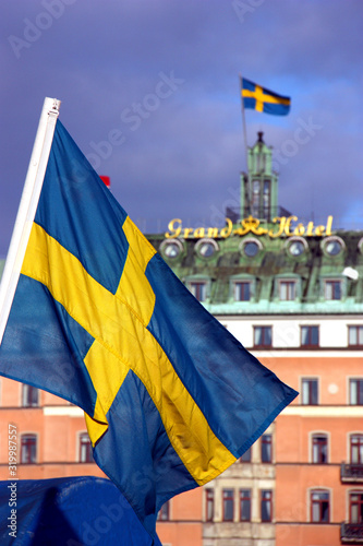 Svenska flagga framför Grand Hotel i Stockholm photo