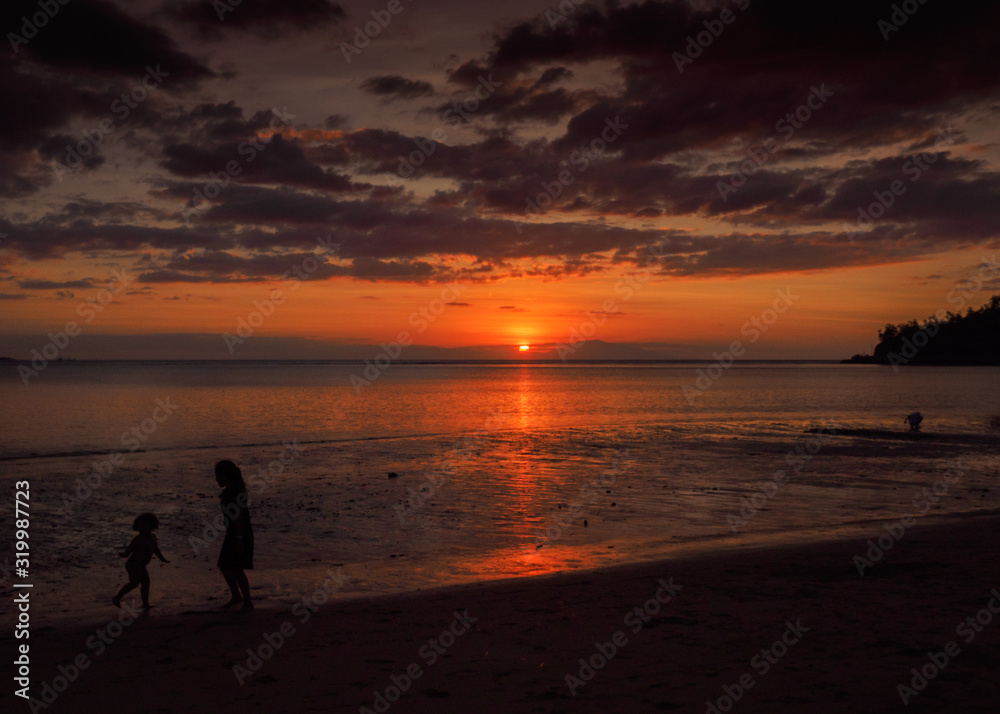 Sunset at Christo Rei Beach, Dili, Timor Leste (East Timor) Sunset at Christo Rei Beach, Dili, Timor Leste (East Timor)