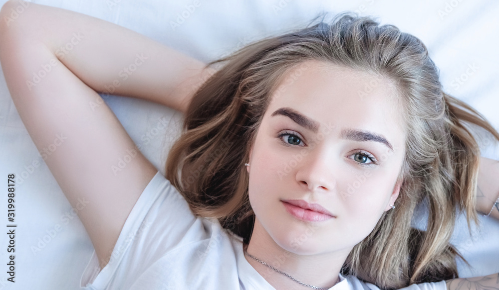beautiful married couple lies hugging in bed, life together, relationship in a pair beautiful married couple lies hugging in bed, life together, relationship in a pair