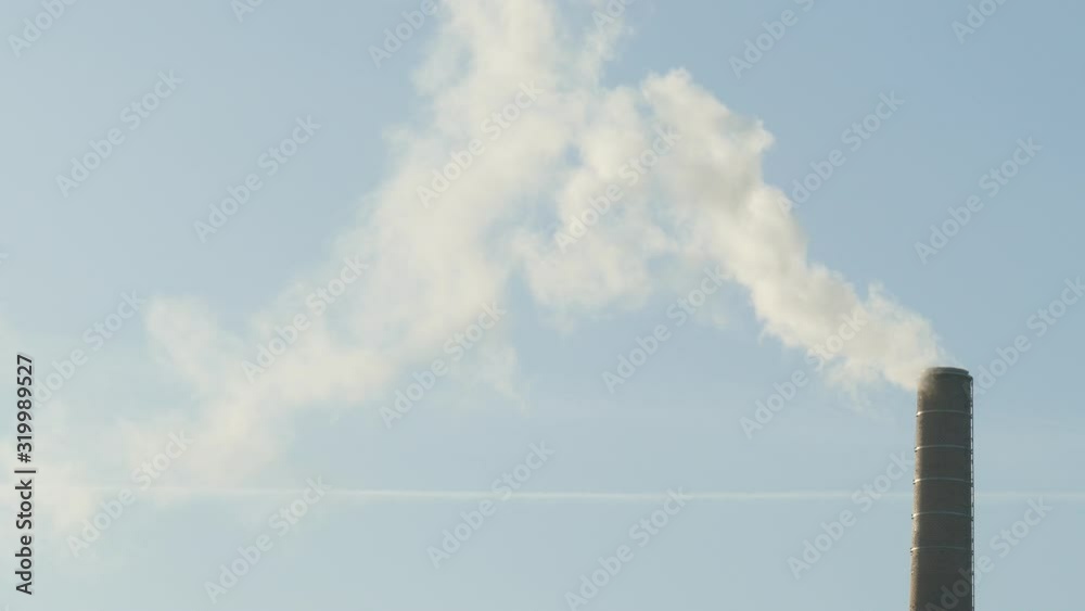 Smoking industrial chimney, power plant, Bremen, Germany, Europe Smoking industrial chimney, power plant, Bremen, Germany, Europe