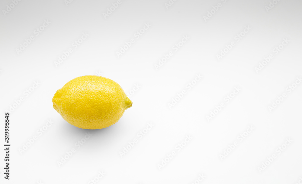 Lemon with shadows on white background Lemon with shadows on white background
