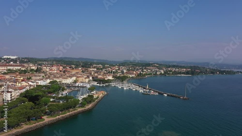 Wallpaper Mural Aerial view of the city center of Desenzano del Garda, Italy. The main lighthouse of the city, boat parking in the city center. Lale Garda, Italy Torontodigital.ca