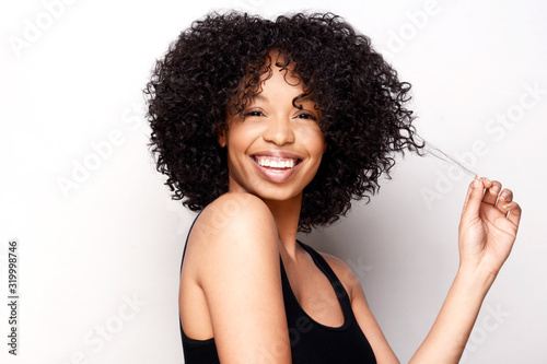 Cheerful African American beauty with natural hairstyle