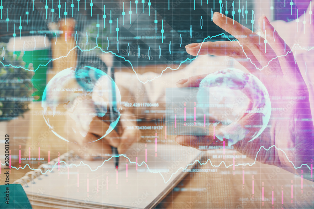 Forex chart displayed on woman's hand taking notes background. Concept of research. Multi exposure Forex chart displayed on woman's hand taking notes background. Concept of research. Multi exposure
