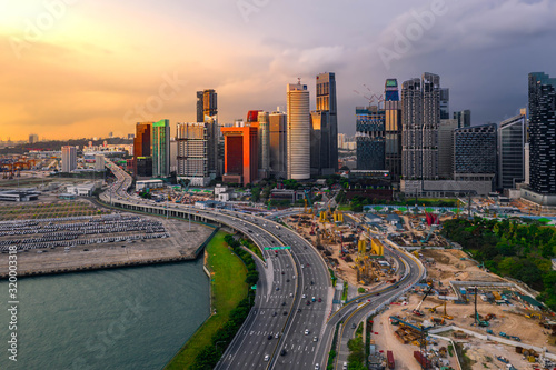 Singapore city skyline at sunset.