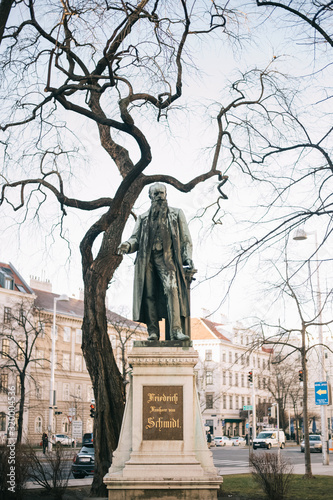 Photography statue sculpture of Mozart in Vienna Austria with trees