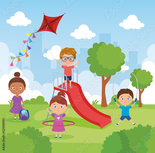 little group children playing in park landscape