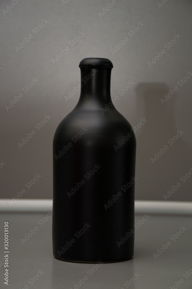 bottle of wine on grey background