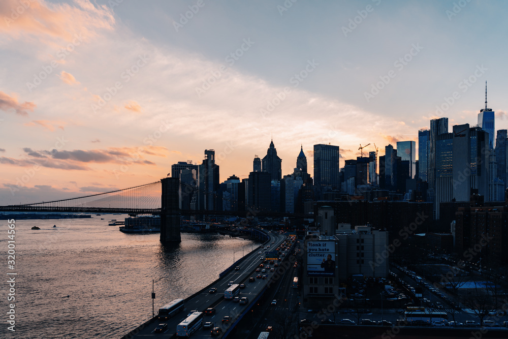 Obraz premium The Sunset over south Manhattan in New York City IV