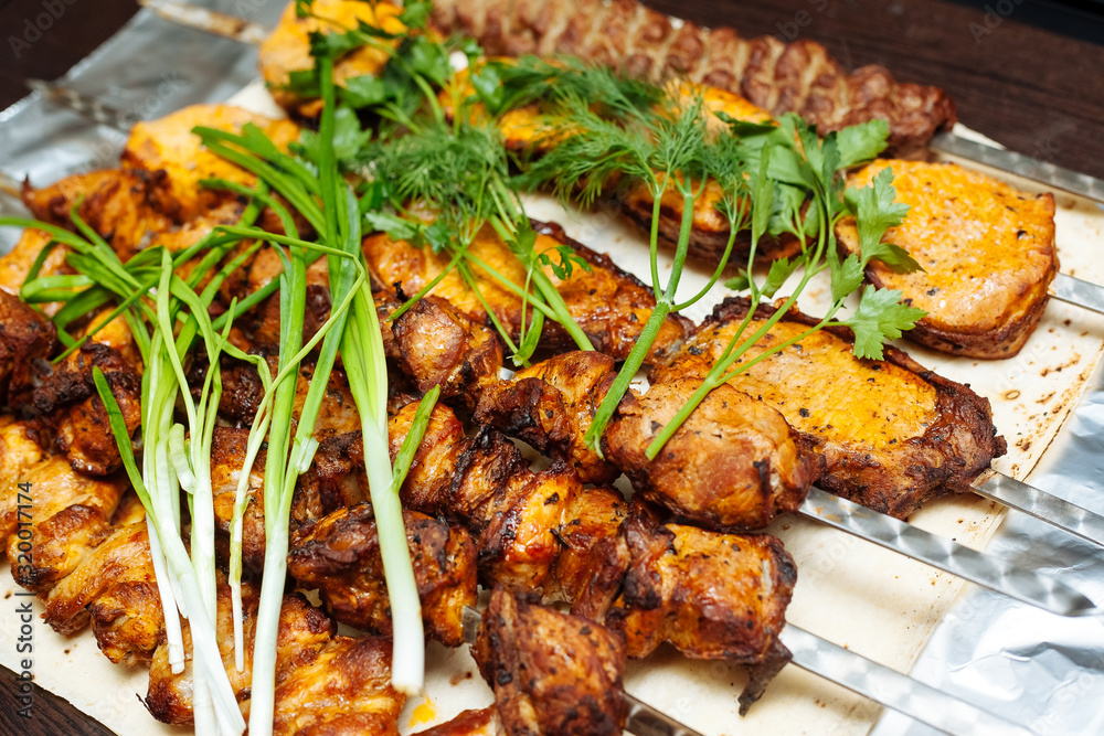 Spiced meat with herbs and onions, fried in tandoor. Shish kebab. Barbecue.