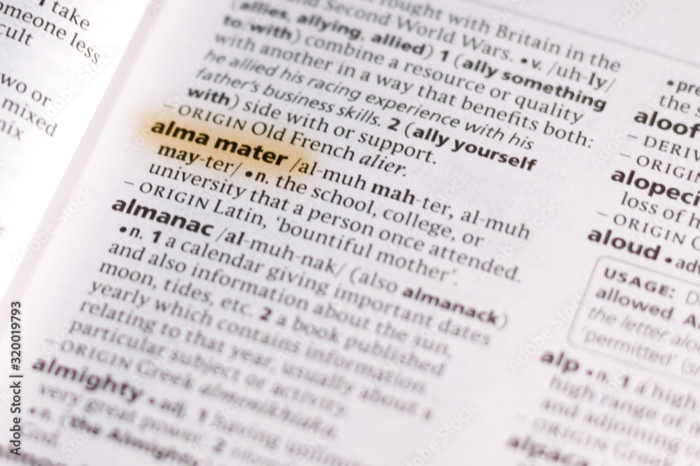 The word or phrase Alma Mater in a dictionary. The word or phrase Alma Mater in a dictionary.