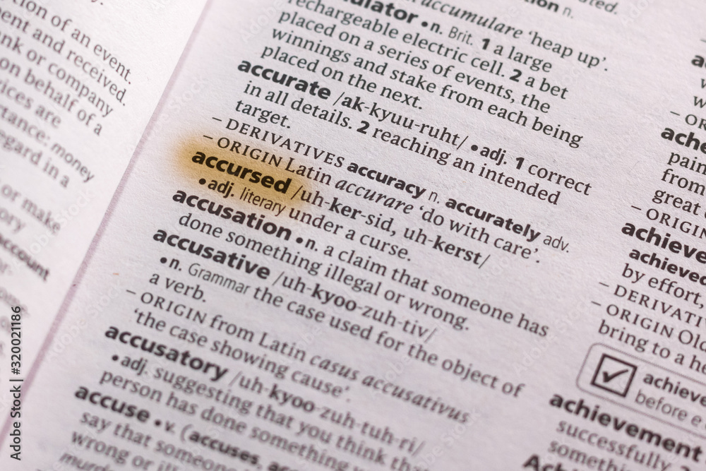 Ivanovsk, Russia - November 19, 2018: The word or phrase Accursed in a dictionary. Ivanovsk, Russia - November 19, 2018: The word or phrase Accursed in a dictionary.
