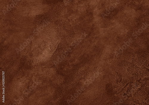 Worn brown marble or cracked concrete background (as an abstract brown vintage background) photo
