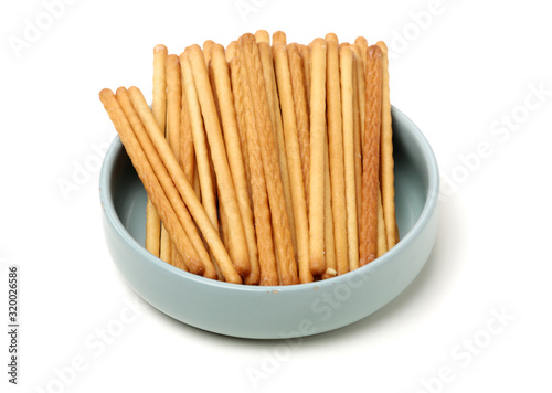 bread sticks on white background 