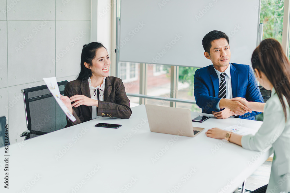 Managers and secretaries meeting and discussing business results from notebooks and paper charging statistics are in the company. Managers and secretaries meeting and discussing business results from notebooks and paper charging statistics are in the company.