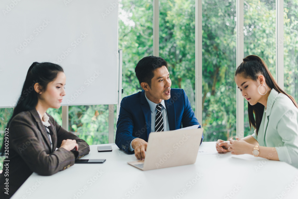 Managers and secretaries meeting and discussing business results from notebooks and paper charging statistics are in the company. Managers and secretaries meeting and discussing business results from notebooks and paper charging statistics are in the company.