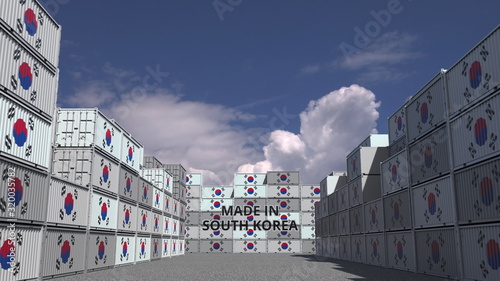 Cargo containers with MADE IN SOUTH KOREA text and national flags. Korean import or export related 3D rendering