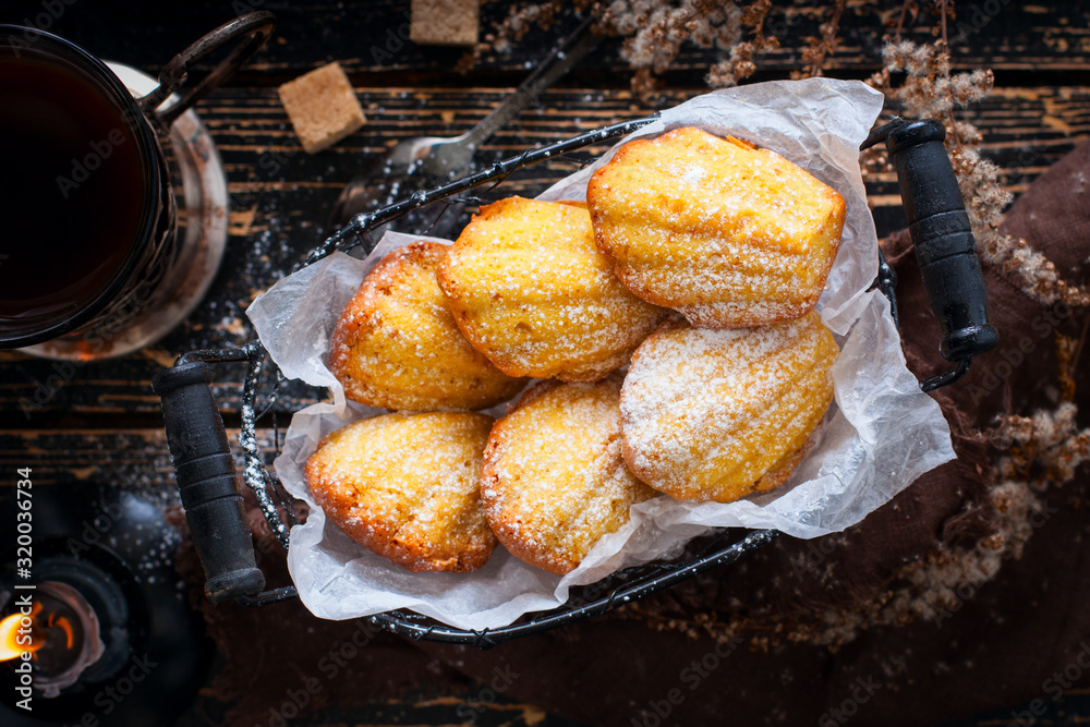 Behang Pumpkin cake madeleines, top view, selective focus