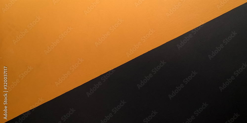 Concrete walls painted in orange and black. Concrete walls painted in orange and black.
