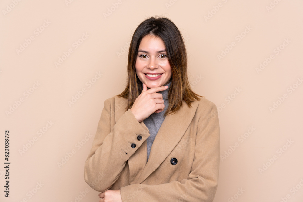 Young woman over isolated background laughing Young woman over isolated background laughing