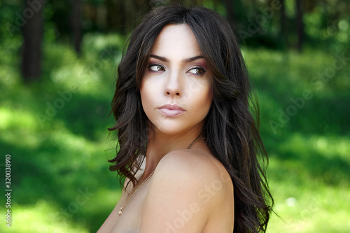 Beautiful female model portrait close up. Soft makeup. Perfect skin