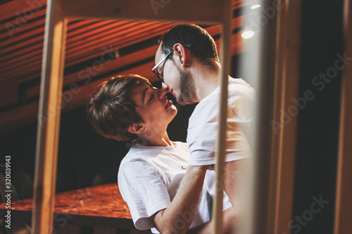 Happy young couple in love kissing and having fun together