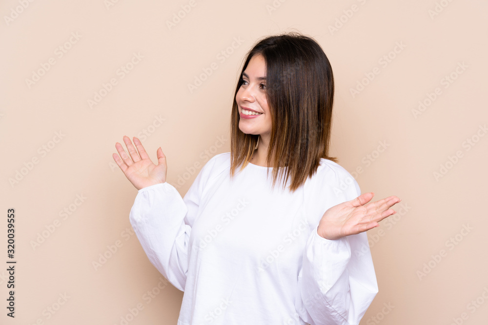 Young woman over isolated background with surprise facial expression Young woman over isolated background with surprise facial expression