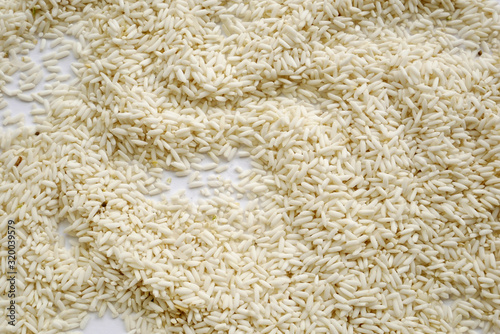 white rice background. organic grain rice
