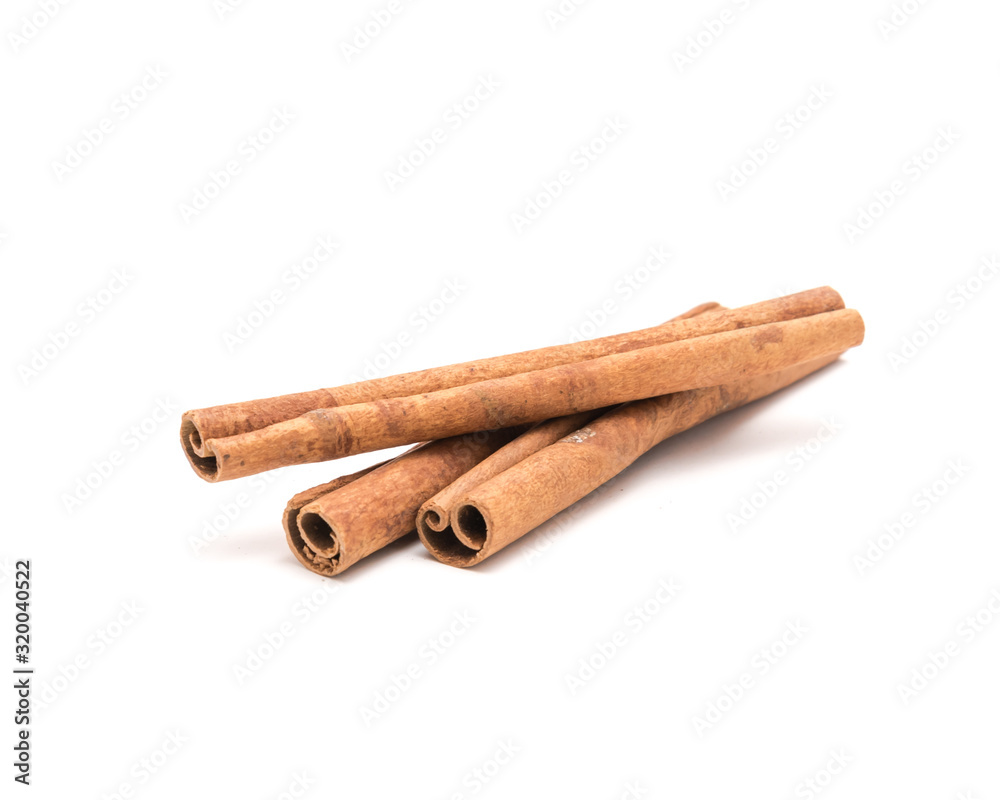 Studio shot three cinnamon stick barks isolated on white Studio shot three cinnamon stick barks isolated on white