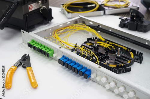 Splicing the fiber optic cable on spice tray