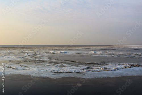 beautiful ice lake and cold winter sky