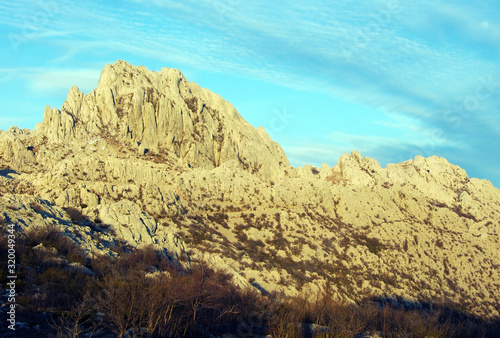 Rocky ridge of Tulove grede or karst mountain peak of Tulovice, Velebit - Croatia photo