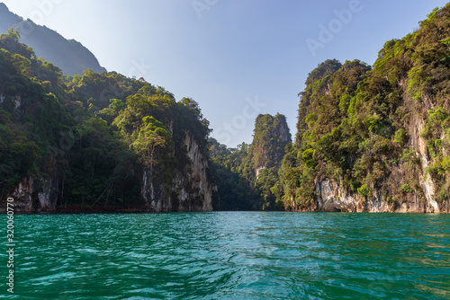 Limestone mountains with trees in the sea in Thailand