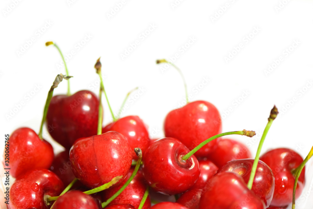 Some cherries isolated on a white background. Some cherries isolated on a white background.