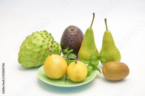 Some varieties of fruit isolated on a white background.