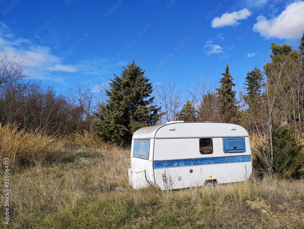 old caravan abandoned in the countryside old caravan abandoned in the countryside