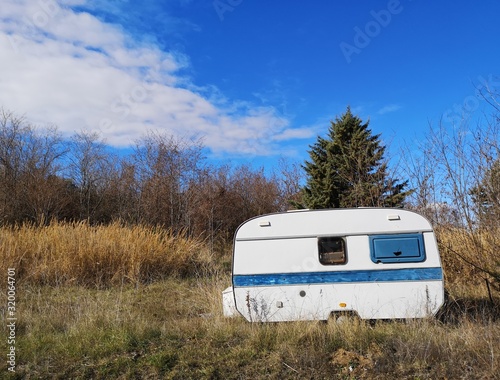 old caravan abandoned in the countryside