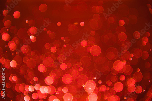 Red bokeh background with sparkle blur bokeh light effect, background bokeh
