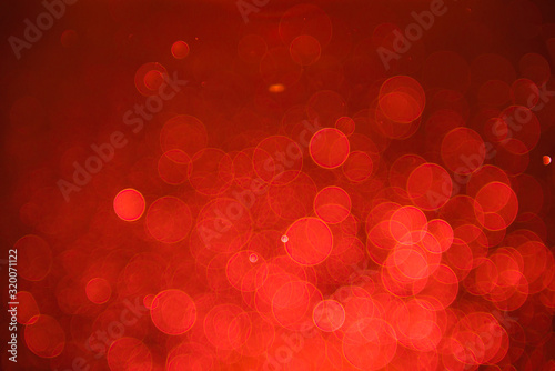 Red bokeh background with sparkle blur bokeh light effect, background bokeh
