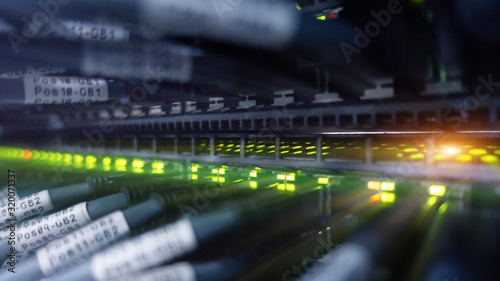 Obraz na płótnie Network server switch with LED flashing. Supercomputer. 